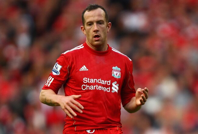 LIVERPOOL, ENGLAND - AUGUST 27:  Charlie Adam of Liverpool with the ball during the Barclays Premier League match between Liverpool and Bolton Wanderers at Anfield on August 27, 2011 in Liverpool, England.  (Photo by Clive Brunskill/Getty Images)