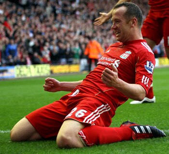 LIVERPOOL, ENGLAND - AUGUST 27:  Charlie Adam of Liverpool celebrates scoring his side's third goal during the Barclays Premier League match between Liverpool and Bolton Wanderers at Anfield on August 27, 2011 in Liverpool, England.  (Photo by Clive Bruns
