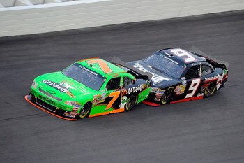 DAYTONA BEACH, FL - JULY 01:  Danica Patrick, driver of the #7 GoDaddy.com Chevrolet, leads Tony Stewart, driver of the #9 Tapout Chevrolet, as they bump draft during the NASCAR Nationwide Series Subway Jalapeno 250 Powered by Coca-Cola at Daytona Interna
