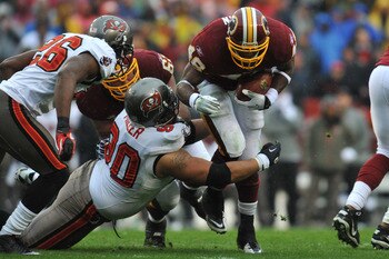 LANDOVER, MD - DECEMBER 12:  Ryan Torain #46 of the Washington Redskins runs the ball against the Tampa Bay Buccaneers  at FedExField on December 12, 2010 in Landover, Maryland. The Buccaneers defeated the Redskins 17-16. (Photo by Larry French/Getty Imag
