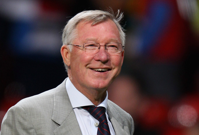 MANCHESTER, ENGLAND - AUGUST 22:  Manchester United manager Sir Alex Ferguson smiles after victory in the Barclays Premier League match between Manchester United and Tottenham Hotspur at Old Trafford on August 22, 2011 in Manchester, England.  (Photo by A