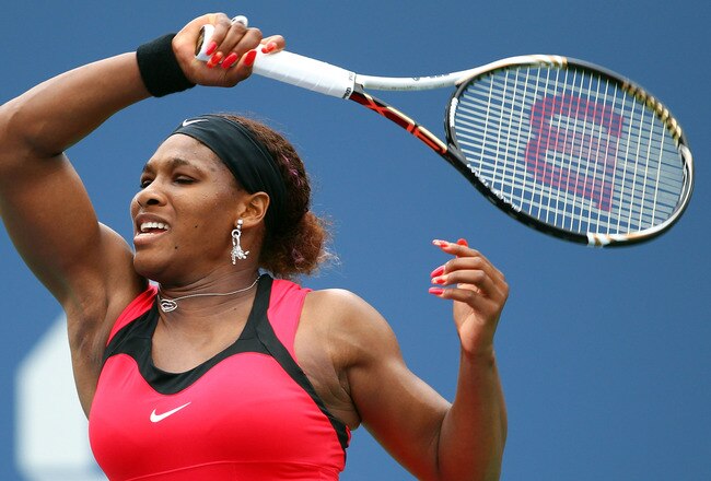 NEW YORK, NY - SEPTEMBER 05:  Serena Williams of the United States returns a shot against Ana Ivanovic of Serbia during Day Eight of the 2011 US Open at the USTA Billie Jean King National Tennis Center on September 5, 2011 in the Flushing neighborhood of