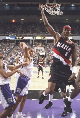 9 Nov 1996:  Forward Cliff Robinson of the Portland Trailblazers slam dunks the ball during a game against the Sacramento Kings at the Arco Arena in Sacramento, California.  The Kings won the game 103-102.   Mandatory Credit: Otto Greule  /Allsport