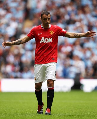 LONDON, ENGLAND - AUGUST 07:  Dimitar Berbatov of Manchester United reacts during the FA Community Shield match sponsored by McDonald's between Manchester City and Manchester United at Wembley Stadium on August 7, 2011 in London, England.  (Photo by Ian W