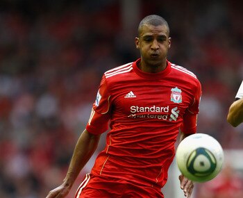 LIVERPOOL, ENGLAND - AUGUST 06:  David Ngog of Liverpool in action during the pre season friendly match between Liverpool and Valencia at Anfield on August 6, 2011 in Liverpool, England.  (Photo by Clive Brunskill/Getty Images)