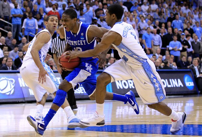 NEWARK, NJ - MARCH 27:  Brandon Knight #12 of the Kentucky Wildcats in action against Dexter Strickland #1 of the North Carolina Tar Heels during the east regional final of the 2011 NCAA men's basketball tournament at Prudential Center on March 27, 2011 i