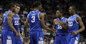 NEWARK, NJ - MARCH 27:  Terrence Jones #3 of the Kentucky Wildcats is congratulated by Brandon Knight #12, Doron Lamb #20 and DeAndre Liggins #34  during the first half of the game against the North Carolina Tar Heels in the east regional final of the 201