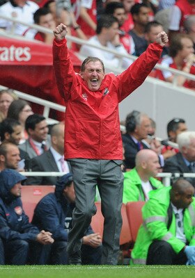 LONDON, ENGLAND - AUGUST 20:  Liverpool manager Kenny Dalglish celebrates victory after the Barclays Premier League match between Arsenal and Liverpool at the Emirates Stadium on August 20, 2011 in London, England.  (Photo by Michael Regan/Getty Images)