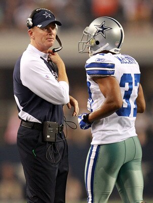 ARLINGTON, TX - AUGUST 11:  Head coach Jason Garrett of the Dallas Cowboys and Bryan McCann #37 at Cowboys Stadium on August 11, 2011 in Arlington, Texas.  (Photo by Ronald Martinez/Getty Images)