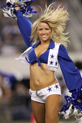 ARLINGTON, TX - AUGUST 21:  A Dallas Cowboys Cheerleader performs at Cowboys Stadium on August 21, 2011 in Arlington, Texas.  (Photo by Ronald Martinez/Getty Images)