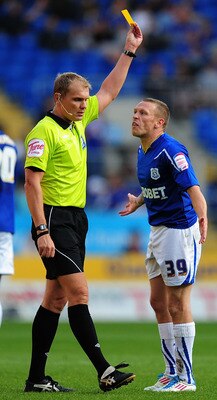 CARDIFF, WALES - MAY 02:  Cardiff player Craig Bellamy complains to referee G D Scott during the npower Championship game between Cardiff City and Middlesbrough at Cardiff City Stadium on May 2, 2011 in Cardiff, Wales.  (Photo by Stu Forster/Getty Images)