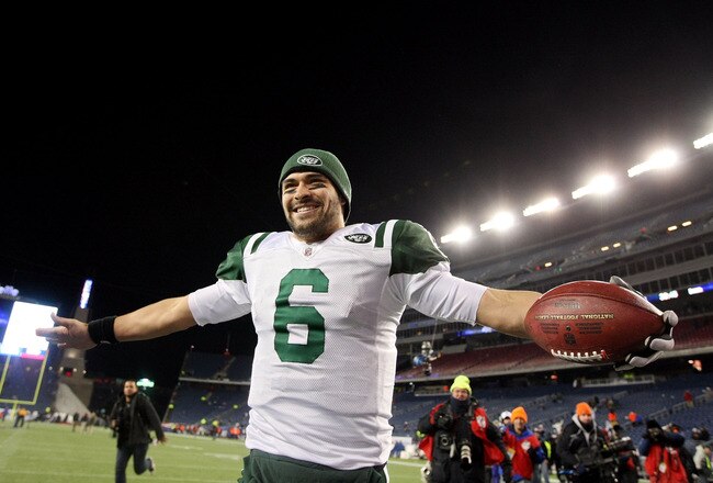 FOXBORO, MA - JANUARY 16:  Mark Sanchez #6 of the New York Jets celebrates after the Jets defeated the Patriots 28 to 21 in their 2011 AFC divisional playoff game at Gillette Stadium on January 16, 2011 in Foxboro, Massachusetts.  (Photo by Al Bello/Getty