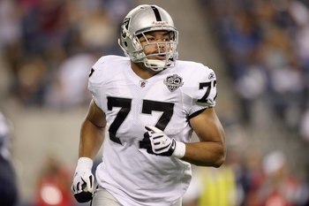 SEATTLE - SEPTEMBER 03:  Matt Shaughnessy #77 of the Oakland Raiders jogs down the field during the game against the Seattle Seahawks on September 3, 2009 at Qwest Field in Seattle, Washington. (Photo by Otto Greule Jr/Getty Images)