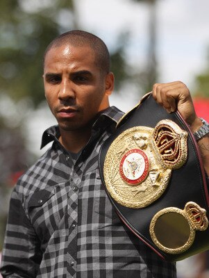 BRENTWOOD, ENGLAND - AUGUST 22:  Andre Ward of the USA poses with the WBA belt during the Carl Froch and Andre Ward Press Conference at Matchroom Sports Head Office on August 22, 2011 in Brentwood, England.  (Photo by Tom Shaw/Getty Images)