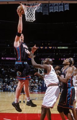 17 Jan 2001:  Bryant Reeves #50 of the Vancouver Grizzlies makes a layup during the game against the Denver Nuggets at the Pepsi Center in Denver, Colorado. The Nuggets defeated the Grizzlies 121-97.    NOTE TO USER: It is expressly understood that the on