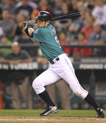 SEATTLE - AUGUST 26:  Ichiro Suzuki #51 of the Seattle Mariners singles in the ninth inning against the Chicago White Sox at Safeco Field on August 26, 2011 in Seattle, Washington. (Photo by Otto Greule Jr/Getty Images)