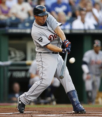 KANSAS CITY, MO - AUGUST 05: Magglio Ordonez #30 of the Detroit Tigers hits a sacrifice fly to score Brennan Boesch in the first inning during a game against the Kansas City Royals at Kauffman Stadium on August 5, 2011 in Kansas City, Missouri.  (Photo by