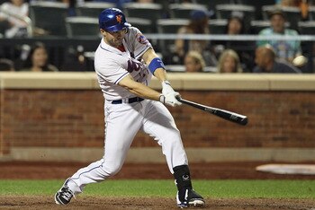NEW YORK, NY - AUGUST 30:  David Wright #5 of the New York Mets connects on a sixth inning base hit against Florida Marlins at Citi Field on August 30, 2011 in the Flushing neighborhood of the Queens borough of New York City.  (Photo by Jim McIsaac/Getty