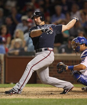 CHICAGO, IL - AUGUST 24:  Dan Uggla #26 of the Atlanta Braves takes a swing against the Chicago Cubs at Wrigley Field on August 24, 2011 in Chicago, Illinois. The Cubs defeated the Braves 3-2.  (Photo by Jonathan Daniel/Getty Images)