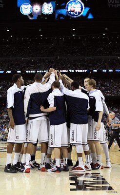 HOUSTON, TX - APRIL 04:  The Connecticut Huskies huddle up before playing against the Butler Bulldogs during the National Championship Game of the 2011 NCAA Division I Men's Basketball Tournament at Reliant Stadium on April 4, 2011 in Houston, Texas.  (Ph