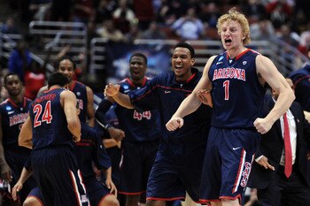 ANAHEIM, CA - MARCH 24:  Kyryl Natyazhko #1 and the bench of the Arizona Wildcats celebrate after a play against the Duke Blue Devils during the west regional semifinal of the 2011 NCAA men's basketball tournament at the Honda Center on March 24, 2011 in