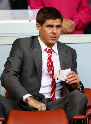 LIVERPOOL, ENGLAND - AUGUST 27:  Injured Steven Gerrard of Liverpool looks on from the stand ahead of the Barclays Premier League match between Liverpool and Bolton Wanderers at Anfield on August 27, 2011 in Liverpool, England.  (Photo by Clive Brunskill/