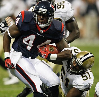 HOUSTON - AUGUST 20:  Running back Ben Tate #44 of the Houston Texans breaks loose from a tackle by linebacker Jonathan Vilma #51 of the New Orleans Saints at Reliant Stadium on August 20, 2011 in Houston, Texas.  (Photo by Bob Levey/Getty Images)