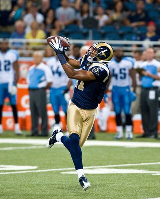 ST. LOUIS, MO - AUGUST 20: Brandon Gibson #11 of the St. Louis Rams catches an 83 yard pass for a touchdown against the Tennessee Titans at the Edward Jones Dome on August 20, 2011 in St. Louis, Missouri.  (Photo by Ed Szczepanski/Getty Images)