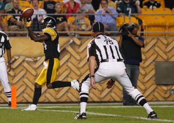 PITTSBURGH - AUGUST 18:  Antonio Brown #84 of the Pittsburgh Steelers catches a touchdown pass against the Philadelphia Eagles in the first half during the preseason game on August 18, 2011 at Heinz Field in Pittsburgh, Pennsylvania.  (Photo by Jared Wick