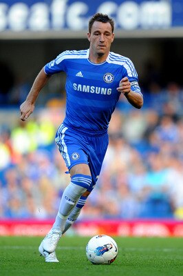 LONDON, ENGLAND - AUGUST 20:  John Terry of Chelsea runs with the ball during the Barclays Premier League match between Chelsea and West Bromwich Albion at Stamford Bridge on August 20, 2011 in London, England.  (Photo by Laurence Griffiths/Getty Images)