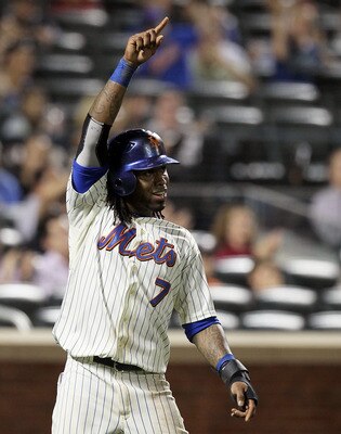 NEW YORK, NY - AUGUST 31:  Jose Reyes #7 of the New York Mets celebrates after scoring in the seventh inning against the Florida Marlins at Citi Field on August 31, 2011 in the Flushing neighborhood of the Queens borough of New York City.  (Photo by Jim M