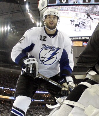 PITTSBURGH, PA - APRIL 27:  Simon Gagne #12 of the Tampa Bay Lightning skates against the Pittsburgh Penguins in Game Seven of the Eastern Conference Quarterfinals during the 2011 NHL Stanley Cup Playoffs at Consol Energy Center on April 27, 2011 in Pitts