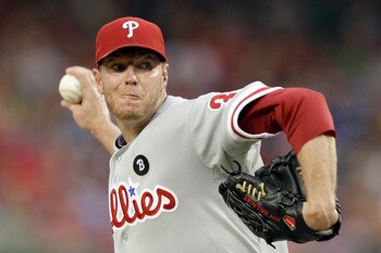 WASHINGTON, DC - AUGUST 21:  Starting pitcher Roy Halladay #34 of the Philadelphia Phillies throws to a Washington Nationals batter during the fourth inning at Nationals Park on August 21, 2011 in Washington, DC.  (Photo by Rob Carr/Getty Images)