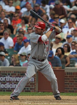 CHICAGO, IL - AUGUST 05:  Joey Votto #19 of the Cincinnati Reds prepares to bat against the Chicago Cubs at Wrigley Field on August 5, 2011 in Chicago, Illinois. The Cubs defeated the Reds 4-3.  (Photo by Jonathan Daniel/Getty Images)