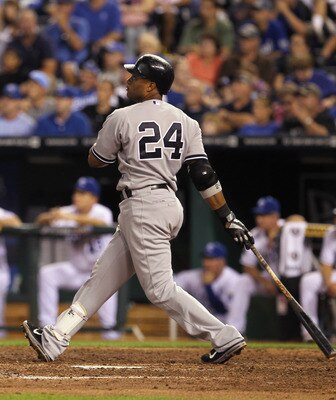 KANSAS CITY, MO - AUGUST 16:  Robinson Cano #24 the New York Yankees hits a 3-run home run during the 4th inning of the game against the Kansas City Royals at Kauffman Stadium on August 16, 2011 in Kansas City, Missouri.  (Photo by Jamie Squire/Getty Imag