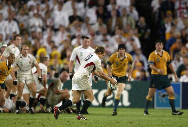 SYDNEY, AUSTRALIA - NOVEMBER 22:  Jonny Wilkinson of England kicks the winning drop goal during extra time in the Rugby World Cup Final match between Australia and England at Telstra Stadium November 22, 2003 in Sydney, Australia. (Photo by Stuart Hannaga