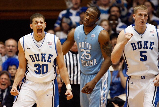DURHAM, NC - FEBRUARY 09:  Seth Curry #30 of the Duke Blue Devils celebrates with teammate Mason Plumlee #5 after defeating the North Carolina Tar heels 79-73 as Justin Knox looks on during their game at Cameron Indoor Stadium on February 9, 2011 in Durha