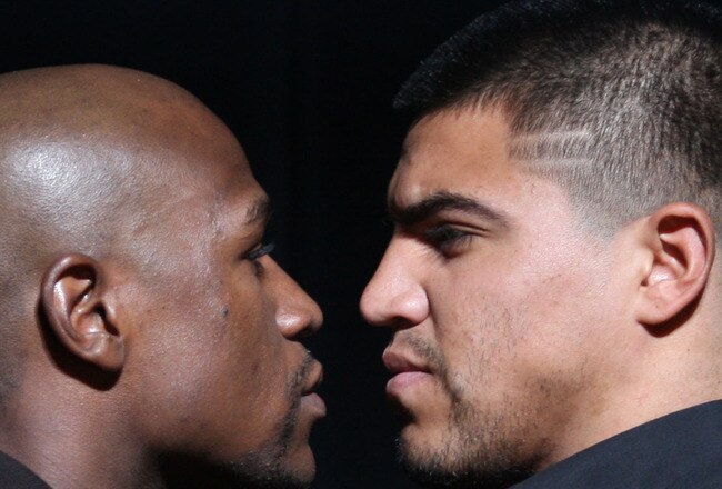 NEW YORK, NY - JUNE 28:  Floyd Mayweather and Victor Ortiz face off at a press conferece about their upcoming fight on June 28, 2011 at the Hudson Theatre in New York City.  (Photo by Daniel Barry/Getty Images)