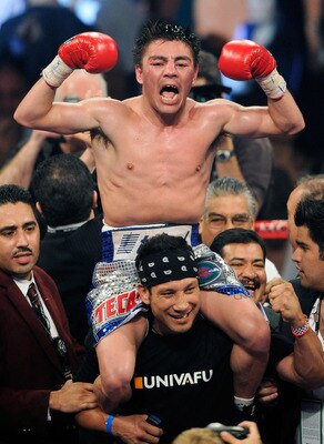 LAS VEGAS, NV - MAY 07:  Jorge Arce  celebrates his 12th-round TKO victory over Wilfredo Vazquez in their WBO super bantamweight title fight at the MGM Grand Garden Arena May 7, 2011 in Las Vegas, Nevada.  (Photo by Ethan Miller/Getty Images)