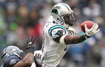 SEATTLE, WA - DECEMBER 05:  Wide receiver Brandon LaFell #11 of the Carolina Panthers just misses this pass against Marcus Trufant #23 of the Seattle Seahawks at Qwest Field on December 5, 2010 in Seattle, Washington. (Photo by Otto Greule Jr/Getty Images