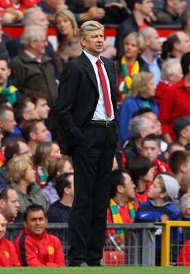 MANCHESTER, ENGLAND - AUGUST 28:  Arsenal manager Arsene Wenger looks on during the Barclays Premier League match between Manchester United and Arsenal at Old Trafford on August 28, 2011 in Manchester, England.  (Photo by Alex Livesey/Getty Images)