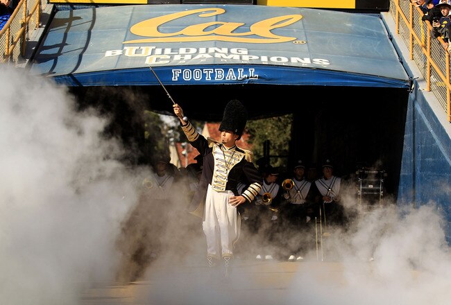 BERKELEY, CA - NOVEMBER 20:  Members of the California Golden Bears marching band run on to the field for their game against the Stanford Cardinal at California Memorial Stadium on November 20, 2010 in Berkeley, California.  (Photo by Ezra Shaw/Getty Imag