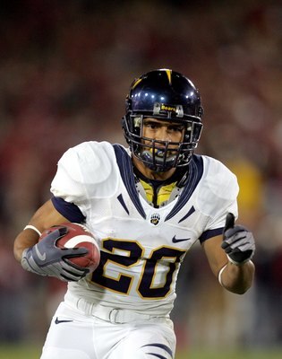 PALO ALTO, CA - NOVEMBER 21:  Isi Sofele #20 of the California Bears runs with the ball during their game against the Stanford Cardinal at Stanford Stadium on November 21, 2009 in Palo Alto, California.  (Photo by Ezra Shaw/Getty Images)