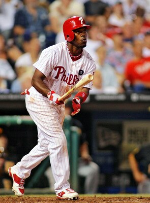 PHILADELPHIA, PA - JULY 29:  Jimmy Rollins #11 of the Philadelphia Phillies watches his seventh-inning home run leave the park against the Pittsburgh Pirates at Citizens Bank Park on July 29, 2011 in Philadelphia, Pennsylvania. The Phillies defeated the P