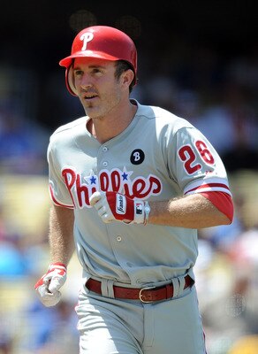 LOS ANGELES, CA - AUGUST 10:  Chase Utley #26 of the Philadelphia Phillies heads off the field against the Los Angeles Dodgers at Dodger Stadium on August 10, 2011 in Los Angeles, California.  (Photo by Harry How/Getty Images)