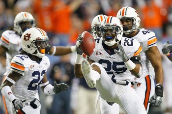 ATLANTA, GA - DECEMBER 04:  Daren Bates #25 of the Auburn Tigers reacts after intercepting a pass by the South Carolina Gamecocks during the 2010 SEC Championship at Georgia Dome on December 4, 2010 in Atlanta, Georgia.  (Photo by Kevin C. Cox/Getty Image