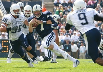 PROVO, UT - SEPTEMBER 23:  Fui Quarterback Jason Beck #7 of the Brigham Young Cougars runs with the ball against the Utah State Aggies on September 23, 2006 at La Vell Edwards Stadium in Provo, Utah.  (Photo By Kent Horner/Getty Images)