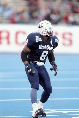 29 Dec 1997:  Defensive back Craig Miller of the Utah State Aggies moves down the field during the Humanitarian Bowl against the Cincinnati Bearcats at Bronco Stadium in Boise, Idaho.  Cincinnati won the game, 35-19. Mandatory Credit: David Seelig  /Allsp