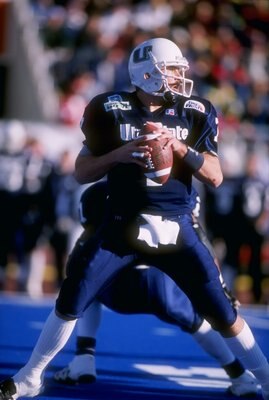 29 Dec 1997:  Quarterback Matt Sauk of the Utah State Aggies looks to pass the ball during the Humanitarian Bowl against the Cincinnati Bearcats at Bronco Stadium in Boise, Idaho.  Cincinnati won the game, 35-19. Mandatory Credit: David Seelig  /Allsport