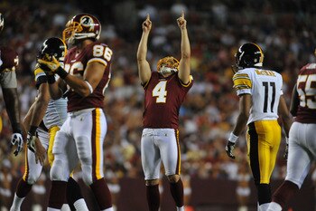 LANDOVER, MD - AUGUST 12:  Graham Gano #4 of the Washington Redskins celebrates a successful field goal against the Pittsburgh Steelers  at FedExField on August 12, 2011 in Landover, Maryland. The Redskins defeated the Steelers 16-7. (Photo by Larry Frenc